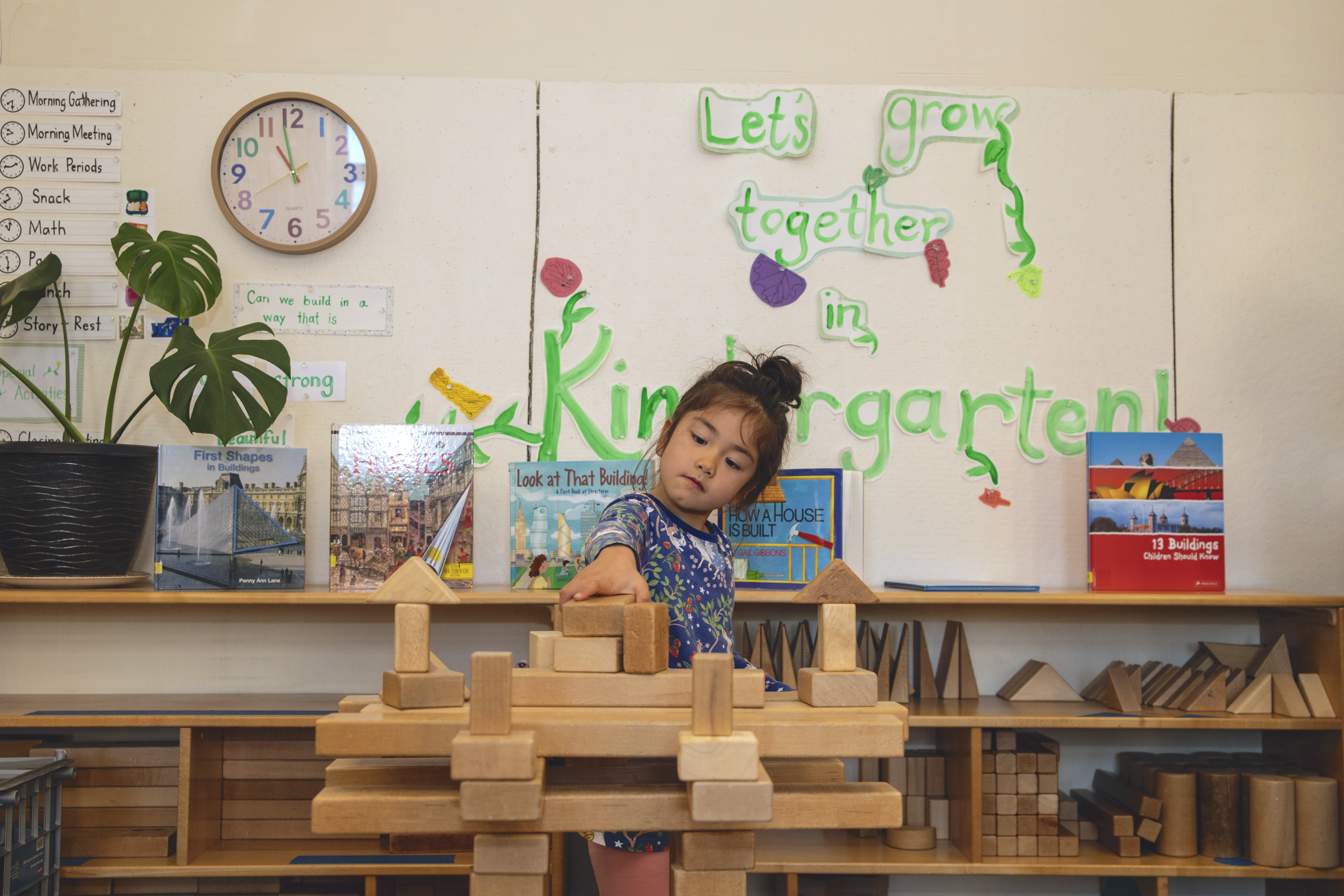 Young students working with math manipulatives at a table