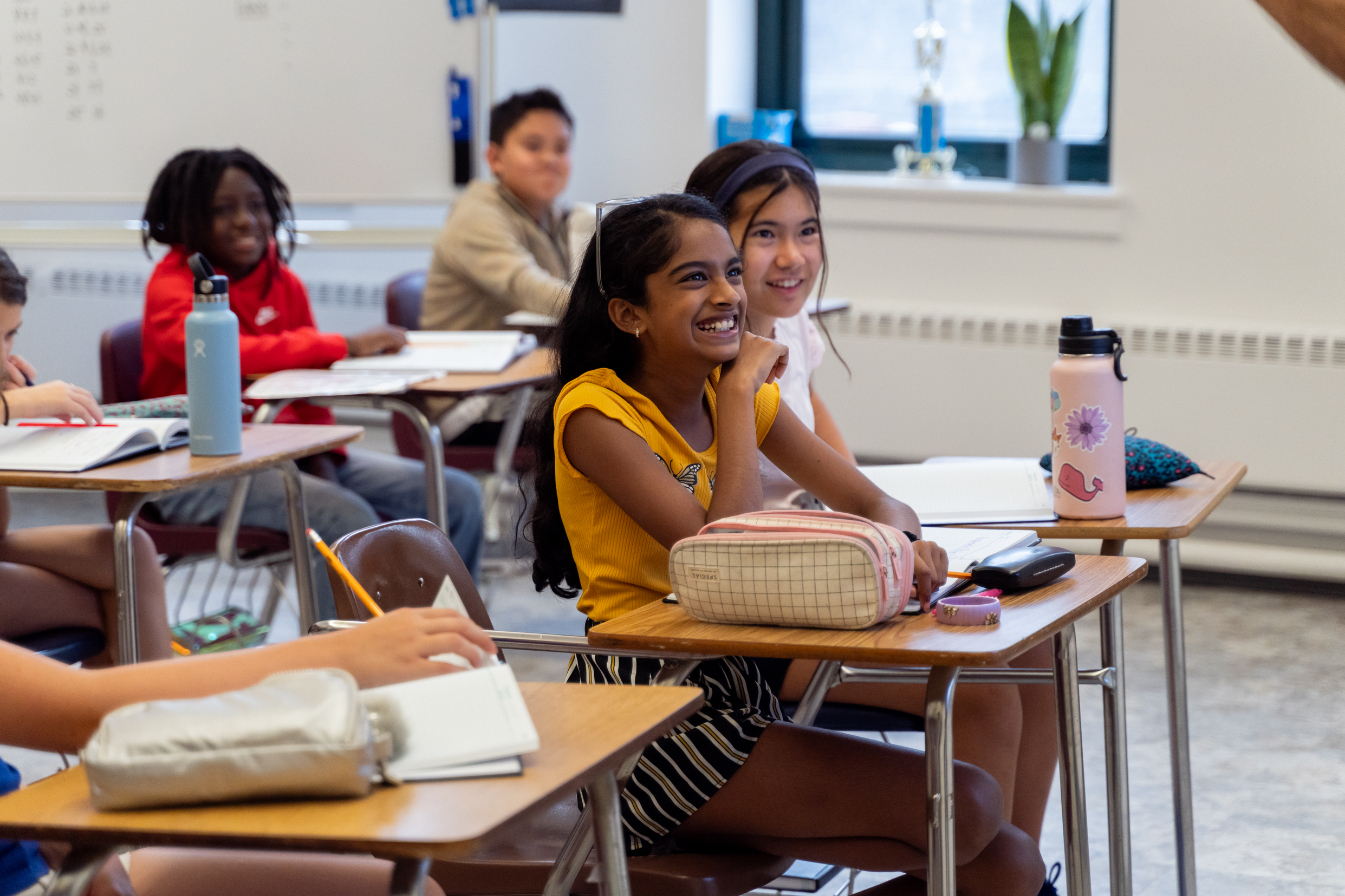 Hudson School middle school students collaborating in class